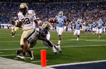 CHARLOTTE, NC - DECEMBER 26:  Jonathan Baldwin #82 of the Pittsburgh Panthers watches as teammate Dion Lewis #28 fumbles the ball at the goal line against the North Carolina Tar Heels during their game on December 26, 2009 in Charlotte, North Carolina.  (
