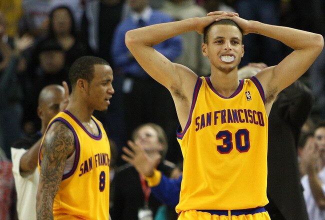OAKLAND, CA - DECEMBER 03: Stephen Curry #30 and Monta Ellis #8 of the Golden State Warriors look on near the end of the game against the Houston Rockets during an NBA game at Oracle Arena on December 3, 2009 in Oakland, California. NOTE TO USER: User exp