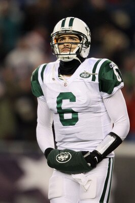 FOXBORO, MA - DECEMBER 06:  Mark Sanchez #6 of the New York Jets looks on against the New England Patriots at Gillette Stadium on December 6, 2010 in Foxboro, Massachusetts.  (Photo by Elsa/Getty Images)