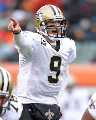 CINCINNATI, OH - DECEMBER 05:  Dree Brees #9 of the New Orleans Saints gives instructions to his team during the NFL game against the Cincinnati Bengals at Paul Brown Stadium on December 5, 2010 in Cincinnati, Ohio.  The Saints won 34-30.  (Photo by Andy 