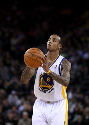 OAKLAND, CA - DECEMBER 02:  Monta Ellis #8 of the Golden State Warriors in action against the Phoenix Suns at Oracle Arena on December 2, 2010 in Oakland, California. NOTE TO USER: User expressly acknowledges and agrees that, by downloading and or using t