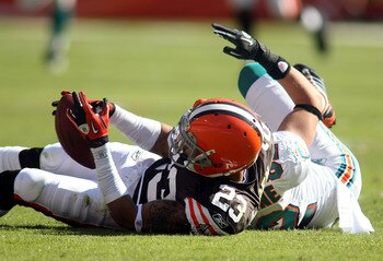 MIAMI - DECEMBER 05:  Defensive back Joe Haden #23 of the Cleveland Browns intercepts the ball against the Miami Dolphins at Sun Life Stadium on December 5, 2010 in Miami, Florida.  (Photo by Marc Serota/Getty Images)