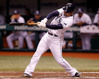 ST. PETERSBURG, FL - SEPTEMBER 29:  Infielder Carlos Pena #23 of the Tampa Bay Rays fouls off a pitch against the Baltimore Orioles during the game at Tropicana Field on September 29, 2010 in St. Petersburg, Florida.  (Photo by J. Meric/Getty Images)