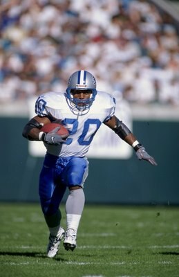 6 Dec 1998:  Barry Sanders #20 of the Detroit Lions carries the ball during the game against the Jacksonville Jaguars at Alltel Stadium in Jacksonville, Florida. The Jaguars defeated the Lions 37-22. Mandatory Credit: Scott Halleran  /Allsport