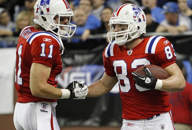 DETROIT - NOVEMBER 25: Julian Edelman #11 of the New England Patriots congratulates teammate Wes Welker #83 after a fourth quarter touchdown during the game against the Detroit Lions at Ford Field on November 25, 2010 in Detroit, Michigan. New England def