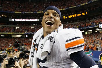 ATLANTA, GA - DECEMBER 04:  Quarterback Cam Newton #2 of the Auburn Tigers celebrates after their 56-17 win over the South Carolina Gamecocks during the 2010 SEC Championship at Georgia Dome on December 4, 2010 in Atlanta, Georgia.  (Photo by Kevin C. Cox