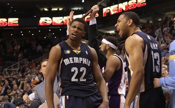PHOENIX - DECEMBER 08:  Rudy Gay #22 of the Memphis Grizzlies reacts with Xavier Henry #13 after Gay hit the game tying three point shot against the Phoenix Suns at the end of regulation in the NBA game at US Airways Center on December 8, 2010 in Phoenix,