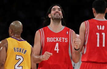 LOS ANGELES, CA - OCTOBER 26:  Luis Scola #4 of the Houston Rockets reacts to a play against the Los Angeles Lakers during their opening night game at Staples Center on October 26, 2010 in Los Angeles, California. NOTE TO USER: User expressly acknowledges
