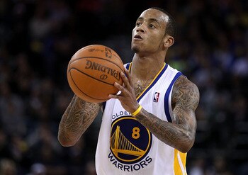 OAKLAND, CA - DECEMBER 02:  Monta Ellis #8 of the Golden State Warriors in action against the Phoenix Suns at Oracle Arena on December 2, 2010 in Oakland, California. NOTE TO USER: User expressly acknowledges and agrees that, by downloading and or using t