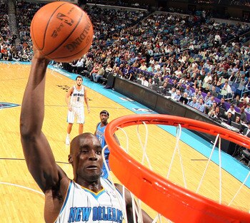 NEW ORLEANS - NOVEMBER 17:  Emeka Okafor #50 of the New Orleans Hornets dunks the ball against the Dallas Mavericks at the New Orleans Arena on November 17, 2010 in New Orleans, Louisiana.  The Hornets defeated the Mavericks 99-97.  NOTE TO USER: User exp