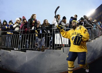 ANN ARBOR, MI - DECEMBER 11:  Louie Caporusso #29 of the Michigan Wolverines enters the stadium for the third period while playing the Michigan State Spartans at Michigan Stadium on December 11, 2010 in Ann Arbor, Michigan.  (Photo by Gregory Shamus/Getty