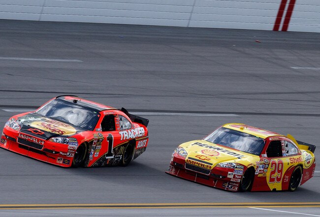 TALLADEGA, AL - APRIL 25:  Kevin Harvick, driver of the #29 Shell/Pennzoil Chevrolet, races Jamie McMurray, driver of the #1 Bass Pro Shops Chevrolet, to the finish of the NASCAR Sprint Cup Series Aaron's 499 at Talladega Superspeedway on April 25, 2010 i