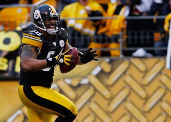 PITTSBURGH - DECEMBER 12:  LaMarr Woodley #56 of the Pittsburgh Steelers returns an interception for a touchdown against the Cincinnati Bengals during the game on December 12, 2010 at Heinz Field in Pittsburgh, Pennsylvania.  (Photo by Jared Wickerham/Get
