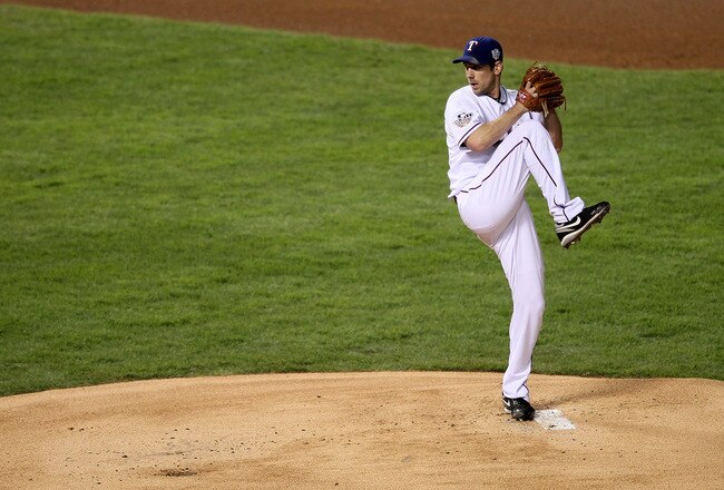 ARLINGTON, TX - NOVEMBER 01:  Cliff Lee #33 of the Texas Rangers pitches against the San Francisco Giants in Game Five of the 2010 MLB World Series at Rangers Ballpark in Arlington on November 1, 2010 in Arlington, Texas.  (Photo by Elsa/Getty Images)