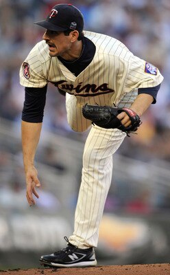 MINNEAPOLIS, MN - OCTOBER 7: Carl Pavano #48 of the Minnesota Twins pitches during game two of the ALDS game against the New York Yankees on October 7, 2010 at Target Field in Minneapolis, Minnesota.  (Photo by Hannah Foslien/Getty Images)