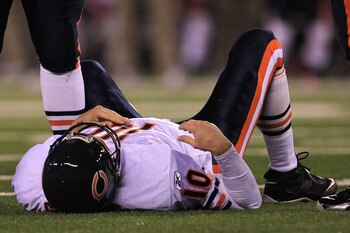 EAST RUTHERFORD, NJ - OCTOBER 03:  Todd Collins #10 of  the Chicago Bears lays on the field after getting injured against the  New York Giants at New Meadowlands Stadium on October 3, 2010 in East  Rutherford, New Jersey.  (Photo by Chris McGrath/Getty Image