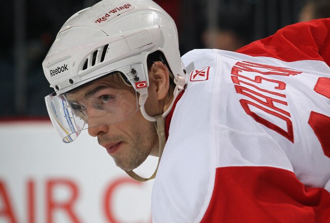 NEWARK, NJ - DECEMBER 11:  Pavel Datsyuk #13 of the Detroit Red Wings skates against the New Jersey Devils at the Prudential Center on December 11, 2010 in Newark, New Jersey. The Red Wings defeated the the Devils 4-1.  (Photo by Bruce Bennett/Getty Image