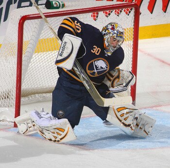 BUFFALO, NY - DECEMBER 09: Ryan Miller #30 of the Buffalo Sabres deflects a shot against the San Jose Sharks at HSBC Arena on December 9, 2010 in Buffalo, New York. Buffalo won 6-3. (Photo by Rick Stewart/Getty Images)