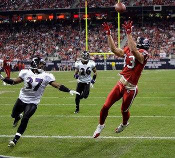 HOUSTON, TX - DECEMBER 13:  Wide receiver  Kevin Walter #83 of the Houston Texans completes a pass in the rear of the endzone but was ruled out of bounds on instant replay during action against the Baltimore Ravens at Reliant Stadium on December 13, 2010