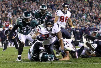 PHILADELPHIA, PA - DECEMBER 02:  Arian Foster #23 of the Houston Texans scores a 3-yard rushing touchdown in the third quarter against the Philadelphia Eagles at Lincoln Financial Field on December 2, 2010 in Philadelphia, Pennsylvania. The Eagles won 34-