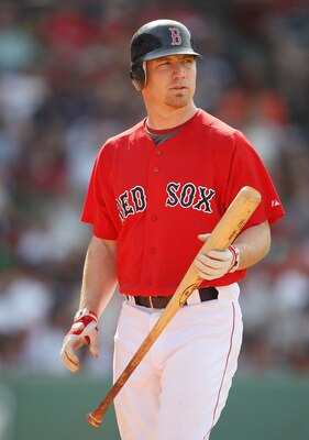 BOSTON - JULY 04:  J.D. Drew #7 of the Boston Red Sox heads back to the dugout after striking out against the Baltimore Orioles on July 4, 2010 at Fenway Park in Boston, Massachusetts. The Orioles defeated the Red Sox 6-1.  (Photo by Elsa/Getty Images)
