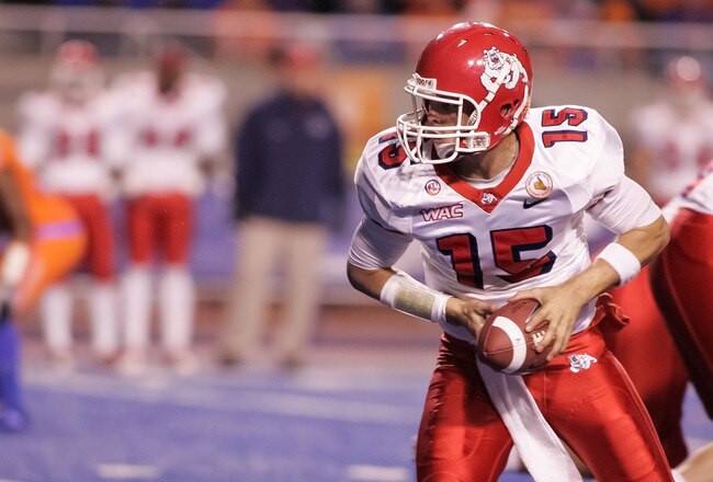 BOISE, ID - NOVEMBER 19:  Ryan Colburn #15 of the Fresno State Bulldogs looks for the handoff against the Boise State Broncos at Bronco Stadium on November 19, 2010 in Boise, Idaho.  (Photo by Otto Kitsinger III/Getty Images)