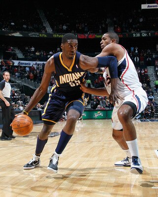 ATLANTA, GA - DECEMBER 11:  Roy Hibbert #55 of the Indiana Pacers against Al Horford #15 of the Atlanta Hawks at Philips Arena on December 11, 2010 in Atlanta, Georgia.  NOTE TO USER: User expressly acknowledges and agrees that, by downloading and/or usin