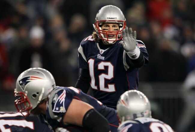 FOXBORO, MA - DECEMBER 19:  Quarterback Tom Brady #12 of the New England Patriots talks to his team during the fourth quarter of the game against the Green Bay Packers at Gillette Stadium on December 19, 2010 in Foxboro, Massachusetts. The Patriots won th