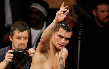LAS VEGAS - DECEMBER 11:  Marcos Maidana of Argentina is lifted up by Sebastian Contursi after Maidana was defeated by Amir Khan of England by unanimous decision in their WBA super lightweight title fight at Mandalay Bay Events Center on December 11, 2010