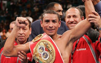 LAS VEGAS - NOVEMBER 27:  Rafael Marquez celebrates after defeating Mauricio Pastrana for the IBF World Bantamweight Championship at the MGM Grand Garden Arena on November 27, 2004 in Las Vegas, Nevada. Marquez defeated Pastrana by TKO after the 8th round