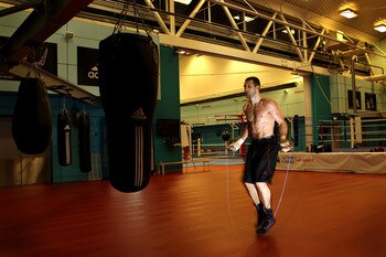 SHEFFIELD, ENGLAND - NOVEMBER 17:  Carl Froch works out with a skipping rope during a media training day ahead of his Super Six fight against Arthur Abraham at the English Institute of Sport on November 17, 2010 in Sheffield, England.  (Photo by Alex Live