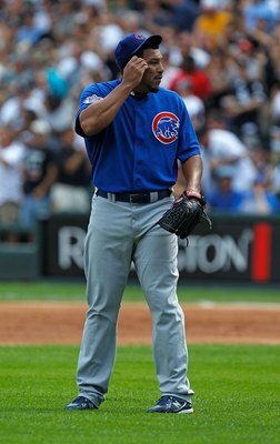 CHICAGO - JUNE 25: Starting pitcher Carlos Zambrano #38 of the Chicago Cubs reacts after giving up a three-run home run in the 1st inning to Carlos Quentin of the Chicago White Sox at U.S. Cellular Field on June 25, 2010 in Chicago, Illinois.  Zambrano wa