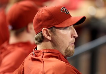 PHOENIX - APRIL 10:  Pitcher Brandon Webb #17 of the Arizona Diamondbacks looks on during the game  against the Los Angeles Dodgers at Chase Field on April 10, 2009 in Phoenix, Arizona. The Diamondbacks defeated the Dodgers 9-4.  (Photo by Christian Peter