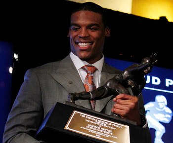 NEW YORK - DECEMBER 11:  Cam Newton, quarterback of the Auburn University Tigers, speaks after being awarded the 2010 Heisman Memorial Trophy Award on December 11, 2010 in New York City.  (Photo by Jeff Zelevansky/Getty Images)