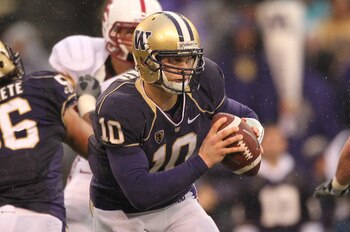 SEATTLE - OCTOBER 30:  Quarterback Jake Locker #10 of the Washington Huskies scrambles against the Stanford Cardinal on October 30, 2010 at Husky Stadium in Seattle, Washington. Stanford won 41-0. (Photo by Otto Greule Jr/Getty Images)