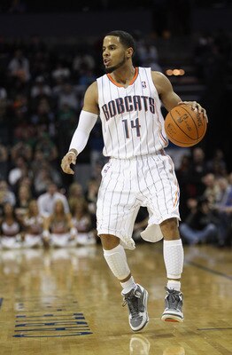 CHARLOTTE, NC - DECEMBER 11:  D.J. Augustin #14 of the Charlotte Bobcats against the Boston Celtics during their game at Time Warner Cable Arena on December 11, 2010 in Charlotte, North Carolina. NOTE TO USER: User expressly acknowledges and agrees that,