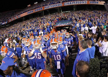 GAINESVILLE, FL - NOVEMBER 13:  The Florida Gators enter the field during a game against the South Carolina Gamecocks at Ben Hill Griffin Stadium on November 13, 2010 in Gainesville, Florida.  (Photo by Mike Ehrmann/Getty Images)