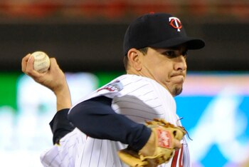 MINNEAPOLIS, MN - OCTOBER 6: Brian Fuentes #51 of the Minnesota Twins pitches during game one of the ALDS agaisnt the New York Yankees on October 6, 2010 at Target Field in Minneapolis, Minnesota. (Photo by Hannah Foslien/Getty Images)