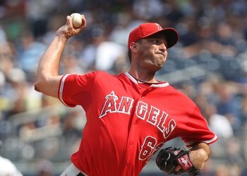 NEW YORK - JULY 21:  Scot Shields #62 of the Los Angeles Angels of Anaheim pitches against the New York Yankees at Yankee Stadium on July 21, 2010 in the Bronx borough of New York City.  (Photo by Nick Laham/Getty Images)