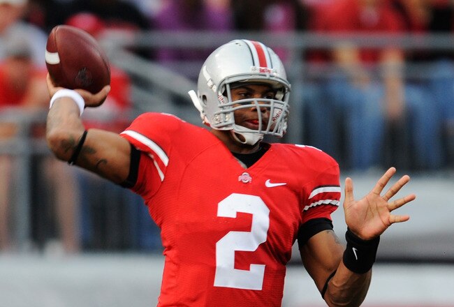 COLUMBUS, OH - NOVEMBER 13:  Terrelle Pryor #2 of the Ohio State Buckeyes completes a pass against the Penn State Nittany Lions at Ohio Stadium on November 13, 2010 in Columbus, Ohio.  (Photo by Jamie Sabau/Getty Images)