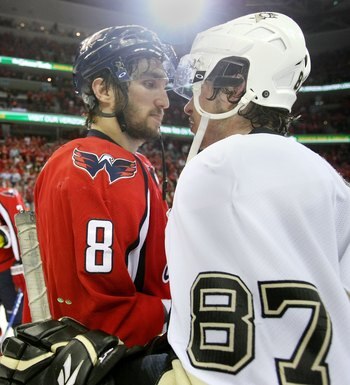 WASHINGTON - MAY 13:  Alex Ovechkin #8 of the Washington Capitals and Sidney Crosby #87 of the Pittsburgh Penguins shake hands after Pittsburgh's 6-2 victory in Game Seven of the Eastern Conference Semifinal  Round of the 2009 Stanley Cup Playoffs at Veri