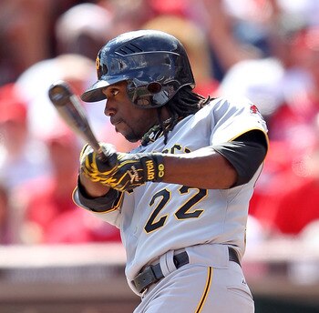 CINCINNATI - SEPTEMBER 12:  Andrew McCutchen #22 of the Pittsburgh Pirates swings at a pitch during the game against the Cincinnati Reds at Great American Ballpark on September 12, 2010 in Cincinnati, Ohio. He hit a three run double in the ninth inning to
