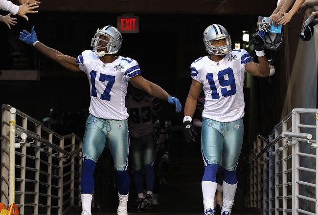 GLENDALE, AZ - DECEMBER 25:  Sam Hurd #17 and Miles Austin #19 of the Dallas Cowboys walk out onto the field before the NFL game against the Arizona Cardinals at the University of Phoenix Stadium on December 25, 2010 in Glendale, Arizona.  The Cardinals d