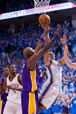OKLAHOMA CITY - APRIL 30: Russell Westbrook #0 of the Oklahoma City Thunder drives to the basket  against the Los Angeles Lakers during Game Six of the Western Conference Quarterfinals of the 2010 NBA Playoffs on April 30, 2010 at the Ford Center in Oklah