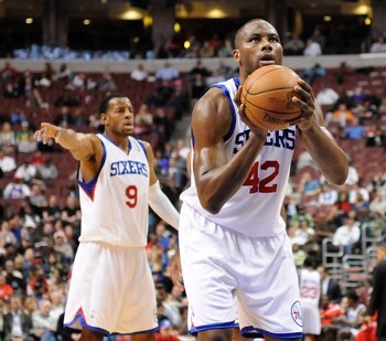 PHILADELPHIA - NOVEMBER 03:  Elton Brand #42 of the Philadelphia 76ers gets set to shoot a free throw as Andre Iguodala #9 gestures to a teammate against the Boston Celtics at the Wachovia Center on November 3, 2009 in Philadelphia, Pennsylvania.  NOTE TO