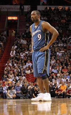 MIAMI, FL - NOVEMBER 29:  Gilbert Arenas #9 of the Washington Wizards looks on during a game against the Miami Heat at American Airlines Arena on November 29, 2010 in Miami, Florida. NOTE TO USER: User expressly acknowledges and agrees that, by downloadin