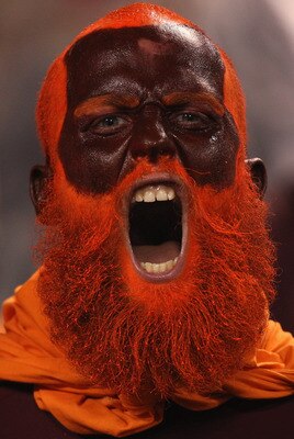 CHARLOTTE, NC - DECEMBER 04:  A fan of the Virginia Tech Hokies cheers on against the Florida State Seminoles during their game at Bank of America Stadium on December 4, 2010 in Charlotte, North Carolina.  (Photo by Streeter Lecka/Getty Images)