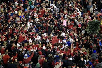 PALO ALTO, CA - NOVEMBER 27:  Fans of the Stanford Cardinal surround their team on the field after they beat the Oregon State Beavers at Stanford Stadium on November 27, 2010 in Palo Alto, California.  (Photo by Ezra Shaw/Getty Images)