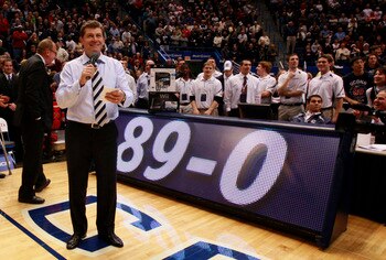 HARTFORD, CT - DECEMBER 21:  Coach Geno Auriemma of Connecticut celebrates a win over  Florida State on December 21, 2010 in Hartford, Connecticut.  Connecticut set a record with 89 straight wins without a defeat. (Photo by Jim Rogash/Getty Images)