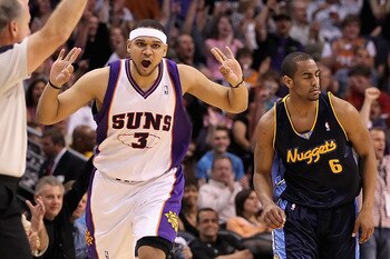 PHOENIX - APRIL 13:  Jared Dudley #3 of the Phoenix Suns reacts after hitting a three point shot over Arron Afflalo #6 of the Denver Nuggets during the NBA game at US Airways Center on April 13, 2010 in Phoenix, Arizona. NOTE TO USER: User expressly ackno